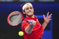 Taylor Fritz plays a forehand shot in his Group C match against Jiri Lehecka at the 2023 United Cup